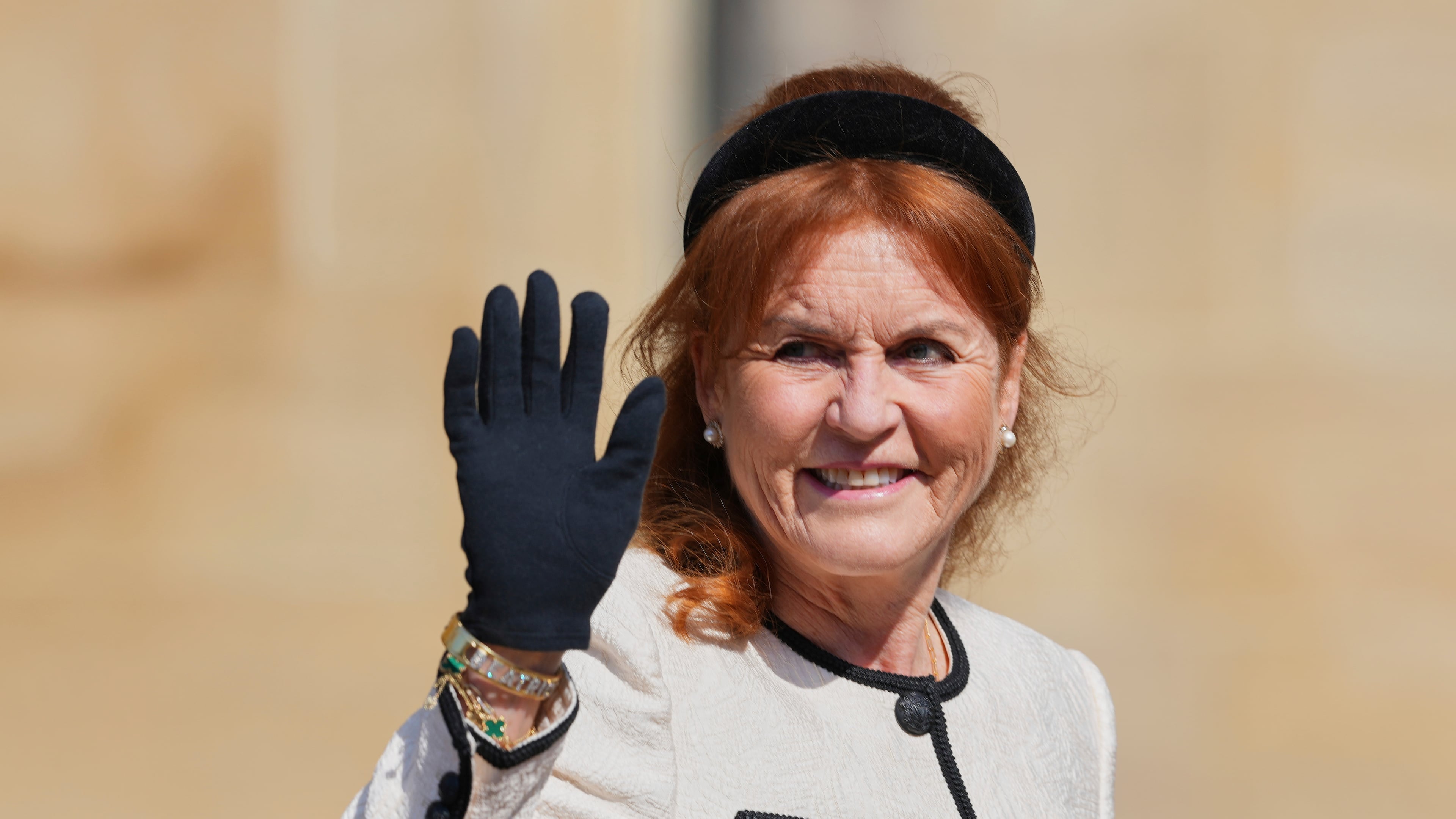 FILE - Sarah Ferguson waves the to the crowd was she attends the Easter Matins Service at St. George's Chapel, Windsor Castle, England, on April 20, 2025. (AP Photo/Kirsty Wigglesworth, Pool, File)