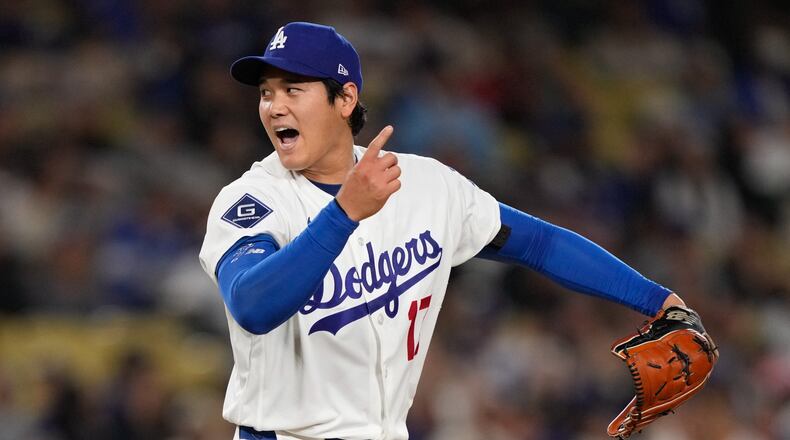 Los Angeles Dodgers starting pitcher Shohei Ohtani reacts after striking out Miami Marlins' Agustin Ramirez during the fifth inning of a baseball game Tuesday, April 28, 2026, in Los Angeles. (AP Photo/Mark J. Terrill)