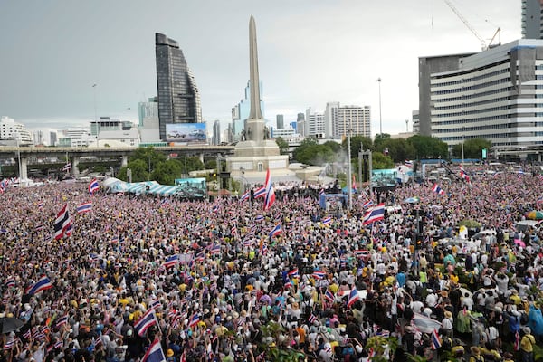 Protesters gather at Victory Monument demanding Thailand's Prime Minister Paetongtarn Shinawatra resign in Bangkok, Thailand, Saturday, June 28, 2025. (AP Photo/Sakchai Lalit)