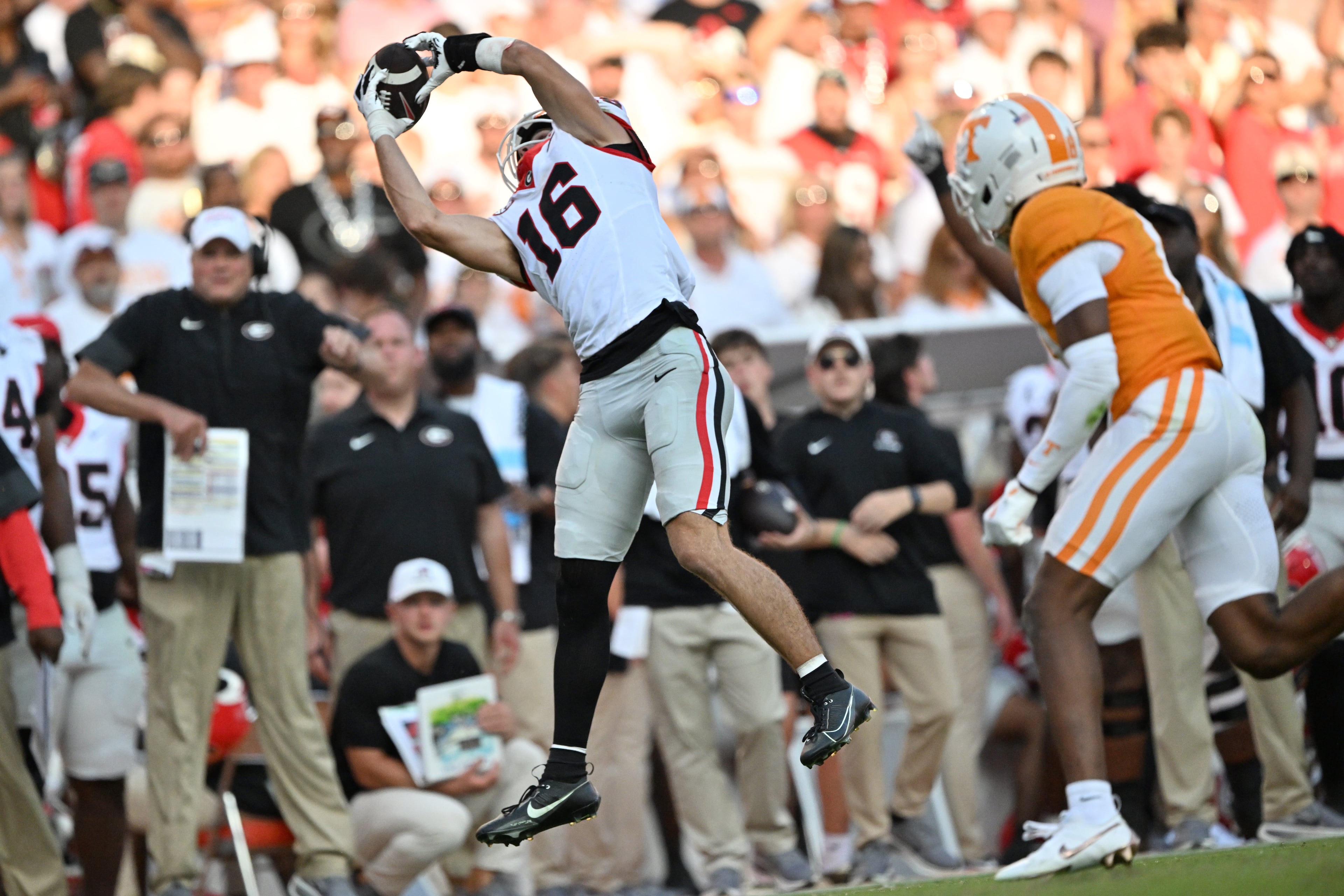 Georgia wide receiver London Humphreys (left) makes a catch during the second half against Tennessee at Neyland Stadium on Saturday, Sept. 13, 2025, in Knoxville, Tenn. Georgia won 44-41 in overtime. (Hyosub Shin/AJC)