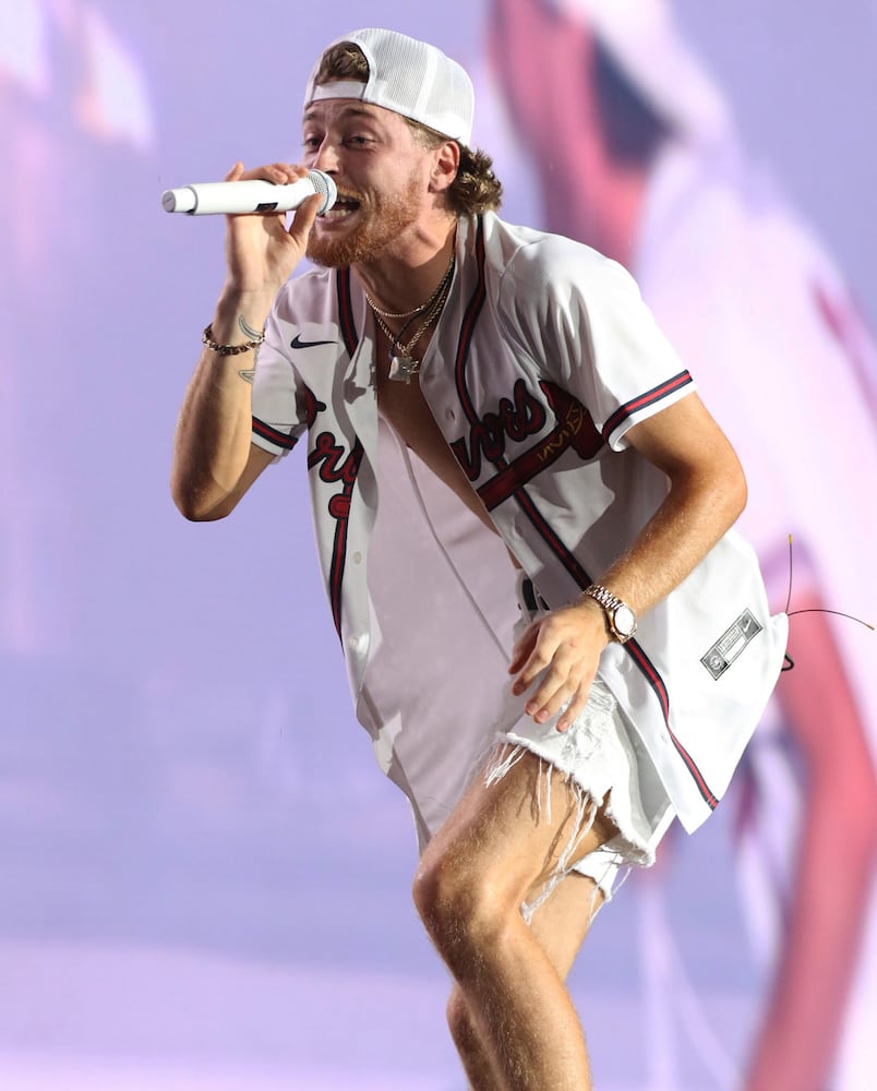 - Bailey Zimmerman performs
Luke Bryan rocked rainy and sold out Truist Park on Saturday, August 17, 2024 on his Mind of a Country Boy Tour. His support acts were Bailey Zimmerman, Kameron Marlowe and American Idol winner Chayce Beckham. 
Robb Cohen for the Atlanta Journal-Constitution