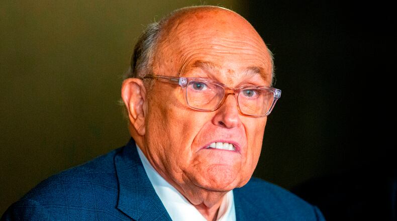 FILE - Rudy Giuliani speaks to the media outside Manhattan federal court in New York, Jan. 3, 2025. (AP Photo/Ted Shaffrey, file)