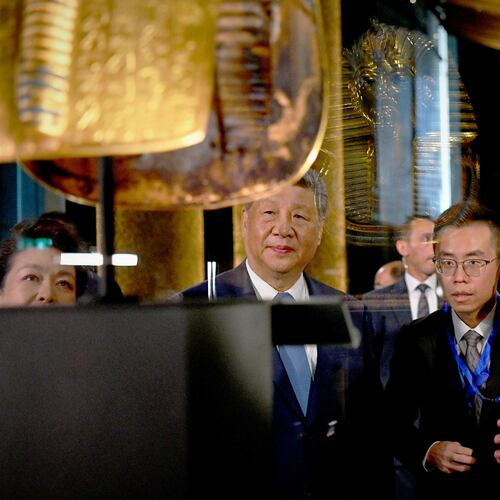 In this photo provided by the Egyptian presidential press office, Chinese President Xi Jinping, center, and Egyptian President Abdel-Fattah el-Sissi, right, tour a gallery displaying the gold funerary mask of Tutankhamun at the Grand Egyptian Museum in Giza, Egypt, Wednesday, Sept. 2, 2026. (Egyptian Presidential Press Office via AP)