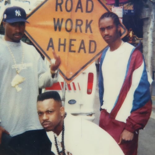 This undated photo provided by Maurice "Mopreme" Shakur on Wednesday, July 22, 2026, shows, from left, Tupac Shakur, Mike Cooley, and Mopreme Shakur, posing for a photo in Los Angeles. (Mopreme Shakur via AP)