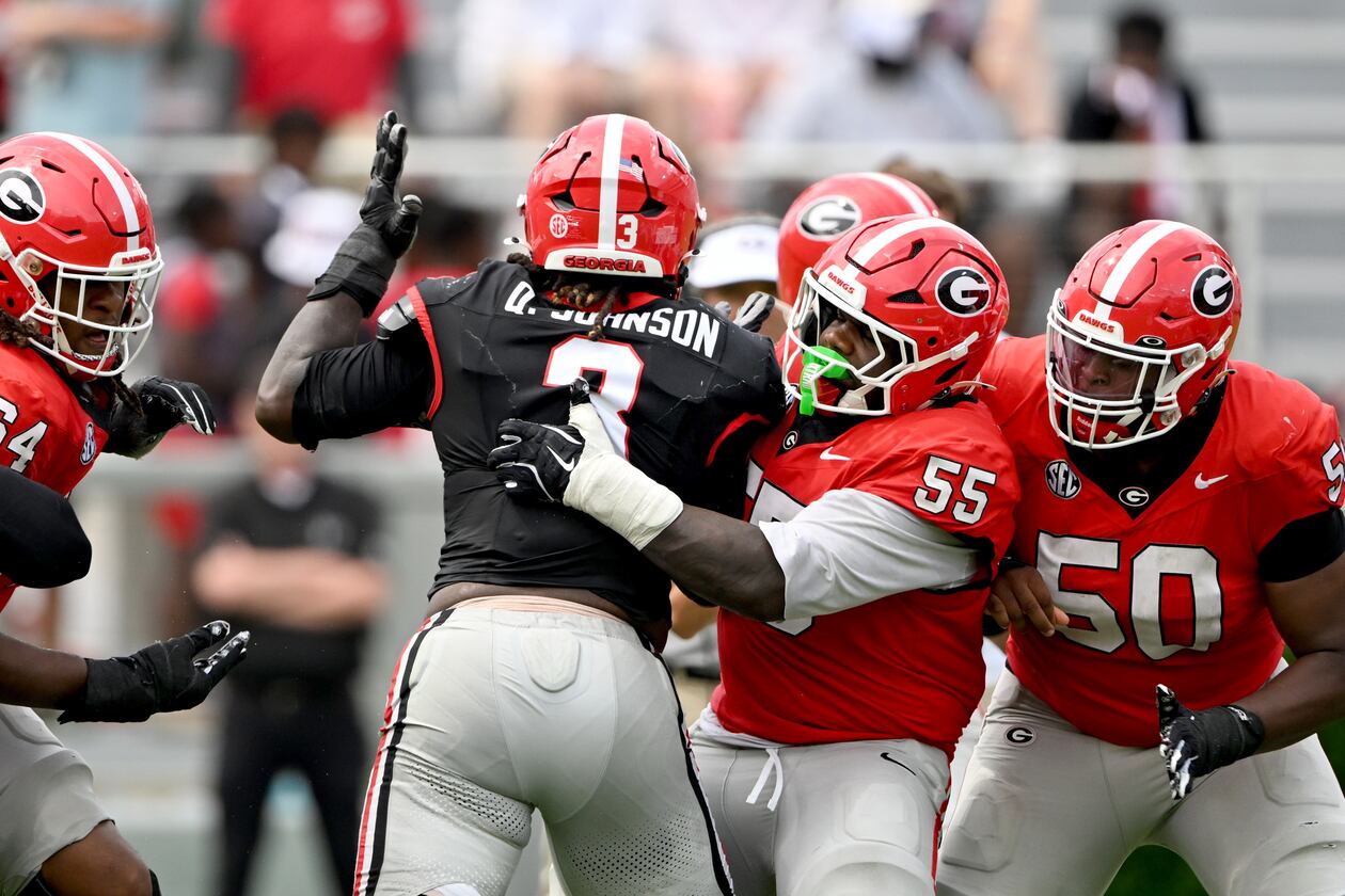 Georgia center Zykie Helton (55) blocks Georgia Quintavius Johnson (3) during 2026 G-Day spring football game at Sanford Stadium, Saturday, April 18, 2026, in Athens. (Hyosub Shin/AJC)