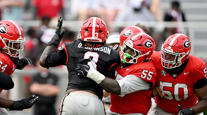 Georgia center Zykie Helton (55) blocks Georgia Quintavius Johnson (3) during 2026 G-Day spring football game at Sanford Stadium, Saturday, April 18, 2026, in Athens. (Hyosub Shin/AJC)