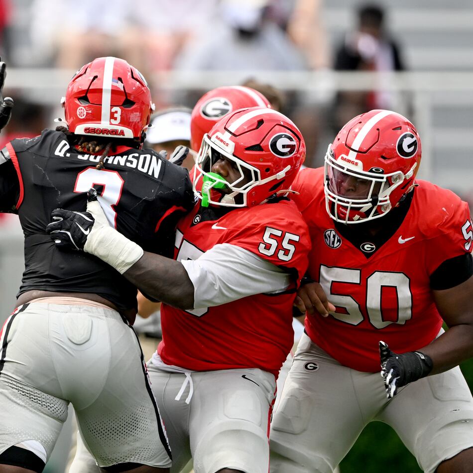 Georgia center Zykie Helton (55) blocks Georgia Quintavius Johnson (3) during 2026 G-Day spring football game at Sanford Stadium, Saturday, April 18, 2026, in Athens. (Hyosub Shin/AJC)
