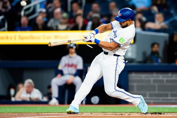 Toronto Blue Jays outfielder Anthony Santander (25) cracks a bat against the Atlanta Braves during second inning MLB baseball action, in Toronto on Tuesday April 15, 2025. (Thomas Skrlj/The Canadian Press via AP)