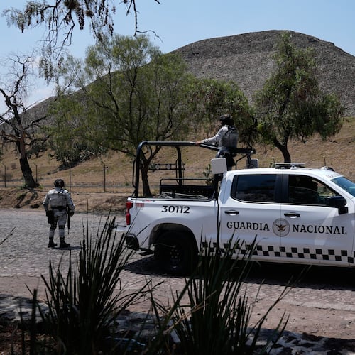 National Guard troops patrol the Teotihuacan pyramids, which remained closed a day after a gunman opened fire on tourists at the archaeological site outside Mexico City, Tuesday, April 21, 2026. (AP Photo/Marco Ugarte)