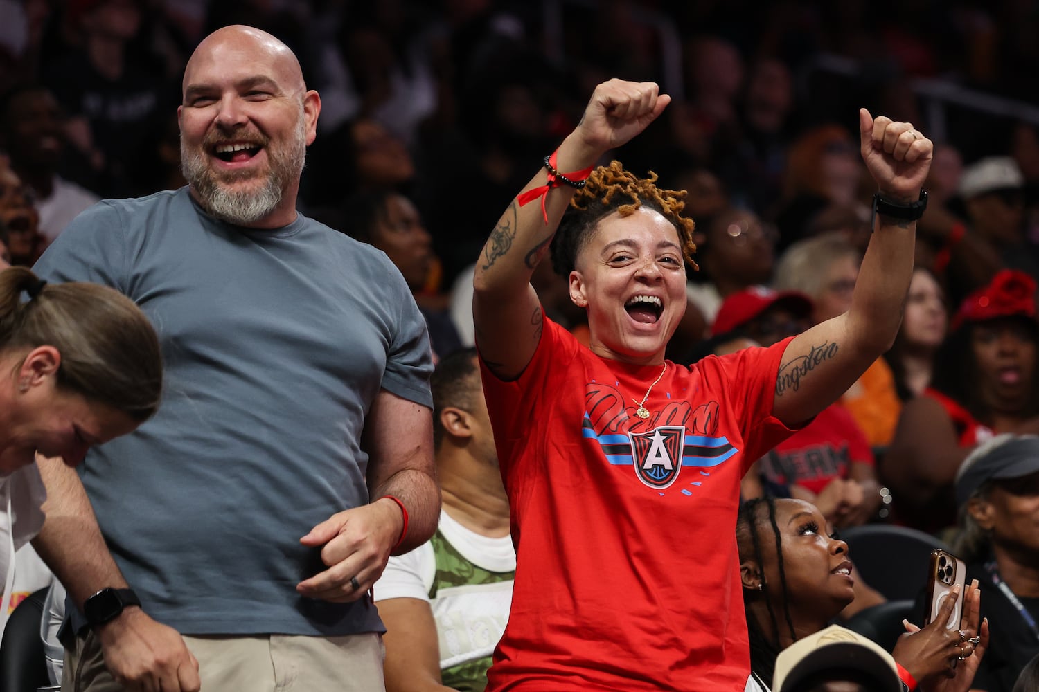 Fans react during the second half of a WNBA game between the Atlanta Dream and Las Vegas Aces at State Farm Arena on Sunday, May 17, 2026, in Atlanta. (Colin Hubbard for the AJC) 