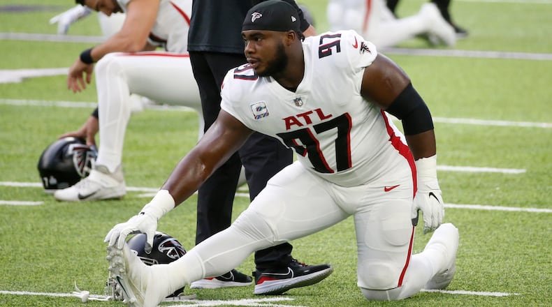 Falcons defensive tackle Grady Jarrett warms up before game against the Minnesota Vikings, Sunday, Oct. 18, 2020, in Minneapolis. (Bruce Kluckhohn/AP)