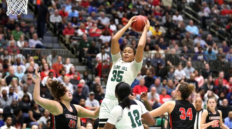 Collins Hill forward Javyn Nicholson (35) grabs a rebound in the second half against Cherokee in the Class AAAAAAA semifinals Saturday, March 2, 2019, at the Buford City Arena in Buford.