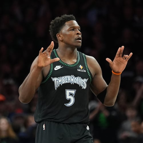 Minnesota Timberwolves guard Anthony Edwards reacts after scoring against the San Antonio Spurs during the first half of Game 4 of an NBA basketball second-round playoffs series in Minneapolis, Sunday, May 10, 2026. (AP Photo/Abbie Parr)