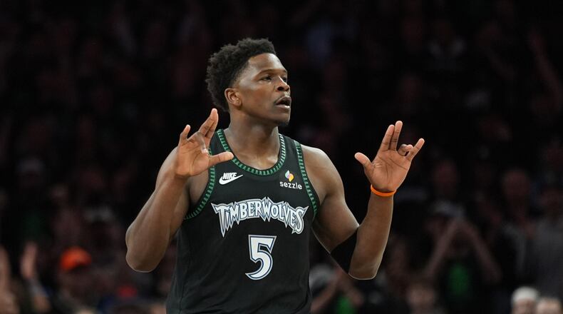 Minnesota Timberwolves guard Anthony Edwards reacts after scoring against the San Antonio Spurs during the first half of Game 4 of an NBA basketball second-round playoffs series in Minneapolis, Sunday, May 10, 2026. (AP Photo/Abbie Parr)