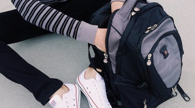 A Florida couple asked their wedding guests to bring backpacks filled with school supplies instead of traditional gifts.