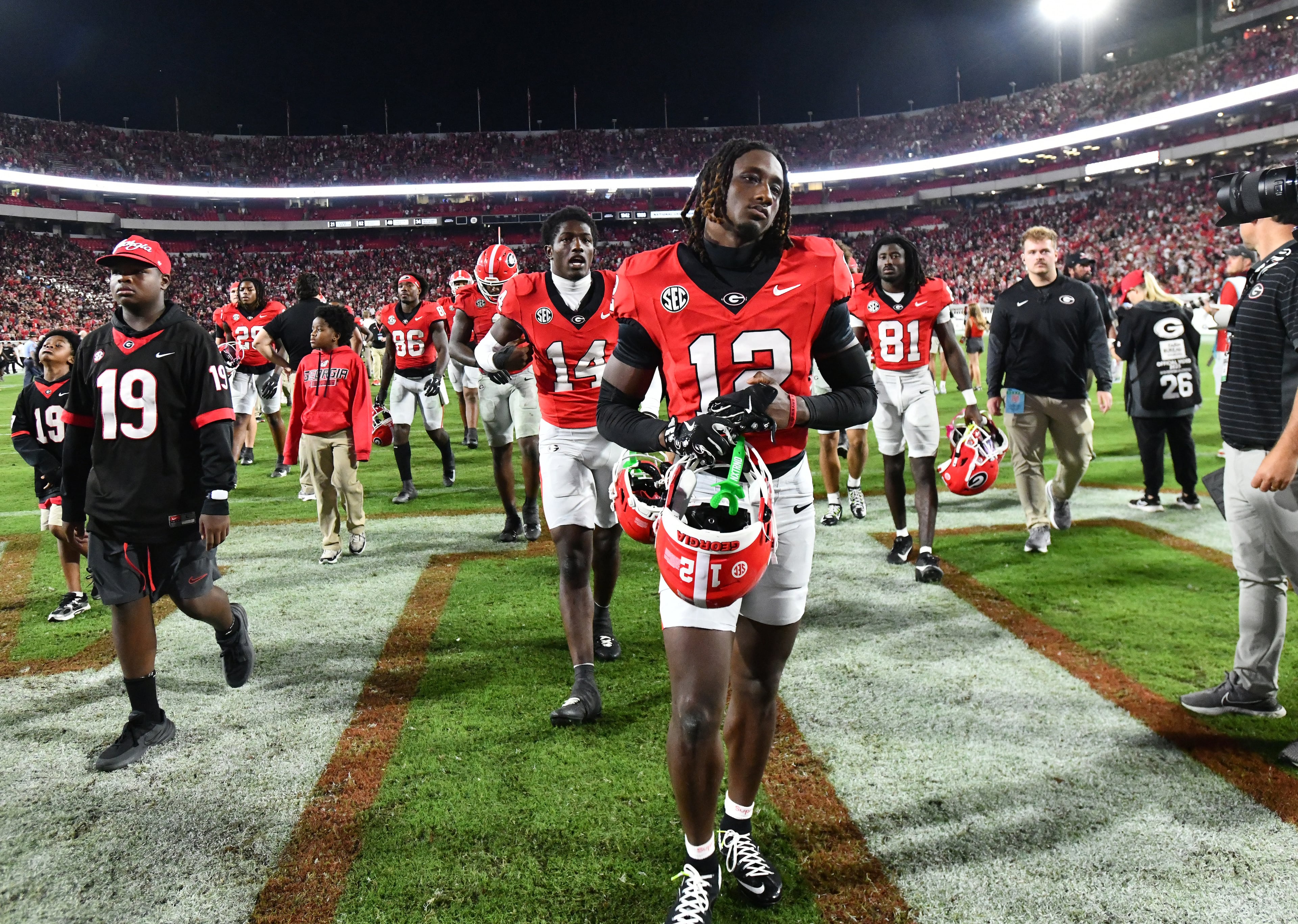 Georgia players leave after Alabama beat Georgia in an NCAA football game at Sanford Stadium, Saturday, September 27, 2025, in Athens. Alabama won 24-21 over Georgia. (Hyosub Shin / AJC)