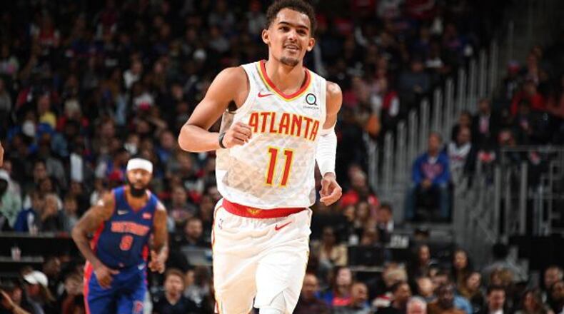 DETROIT, MI - OCTOBER 24: Trae Young #11 of the Atlanta Hawks smiles against the Detroit Pistons on October 24, 2019 at Little Caesars Arena in Detroit, Michigan. NOTE TO USER: User expressly acknowledges and agrees that, by downloading and/or using this photograph, User is consenting to the terms and conditions of the Getty Images License Agreement. Mandatory Copyright Notice: Copyright 2019 NBAE (Photo by Chris Schwegler/NBAE via Getty Images)