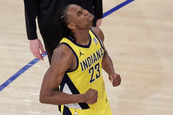 Indiana Pacers forward Aaron Nesmith (23) reacts at the end of overtime against the New York Knicks of Game 1 of the NBA basketball Eastern Conference final, Wednesday, May 21, 2025, in New York. (AP Photo/Adam Hunger)