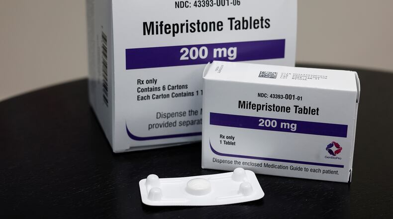 The U.S. Supreme Court this week agreed to hear a case that would limit the availability of mifepristone, the most common drug used for abortions. A decision will likely come in June, in the midst of the 2024 election. (Photo illustration by Anna Moneymaker/Getty Images/TNS)