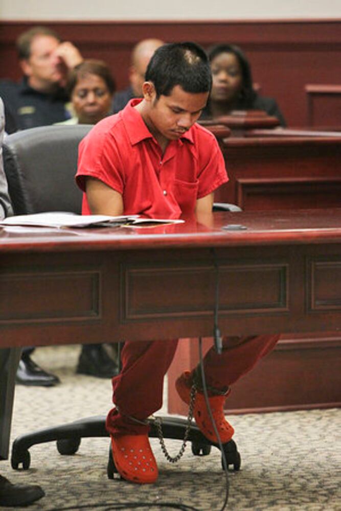Teen in court, accused of killing cop