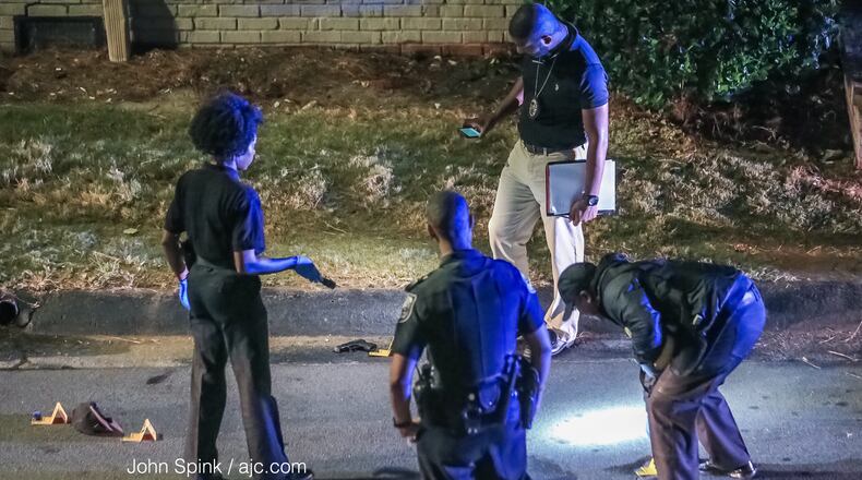 Officers found a stolen gun outside an apartment building on Chamblee Tucker Road early Tuesday morning.