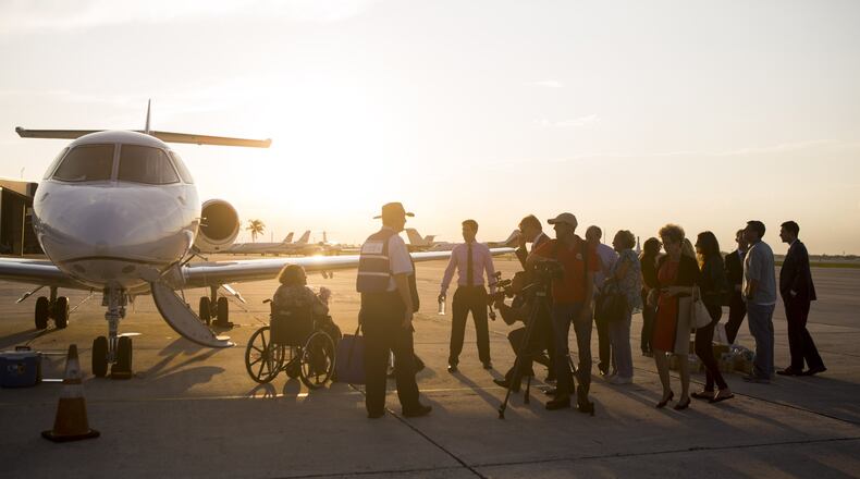 People arrive in West Palm Beach, Florida, from Puerto Rico on Tuesday, Sep. 26, 2017. The Eagles Wings Foundation led a rescue mission that transported elderly nursing home patients and some family members to safety after Hurricane Maria ravaged Puerto Rico. (Calla Kessler / The Palm Beach Post)