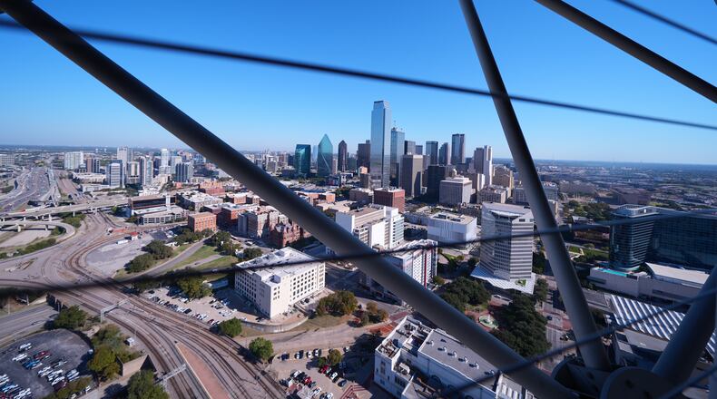 FILE - The Dallas skyline is visible through the framing of Reunion Tower, Nov. 6, 2025, in Dallas. (AP Photo/Julio Cortez, File)