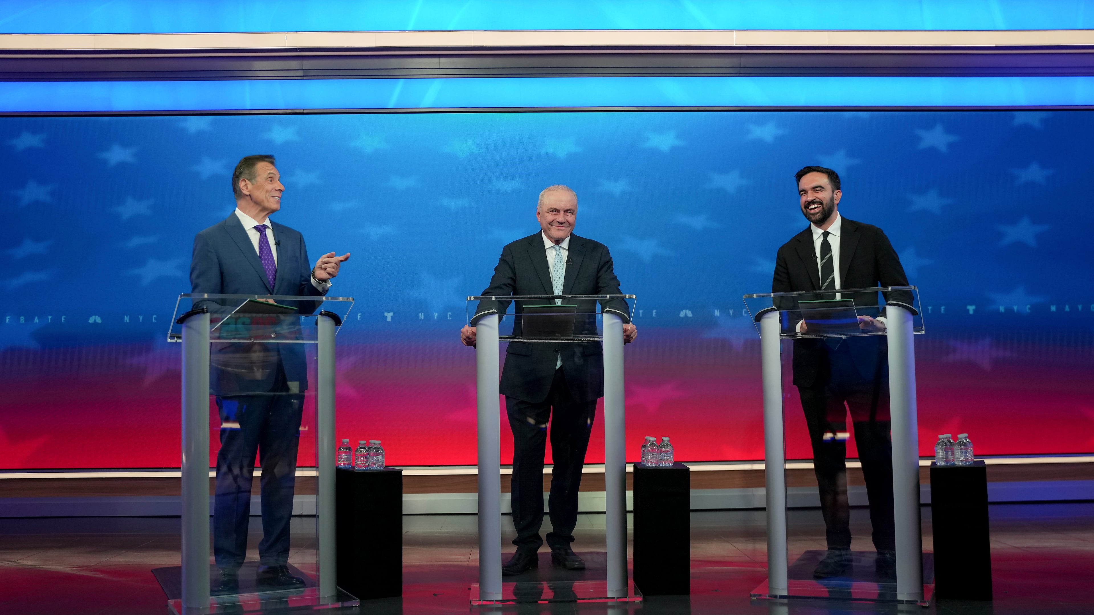 From left, Mayoral candidates Independent candidate former New York Gov. Andrew Cuomo, Republican candidate Curtis Sliwa and Democratic candidate Zohran Mamdani participate in a mayoral debate, Thursday, Oct. 16, 2025, in New York. (AP Photo/Angelina Katsanis, Pool)
