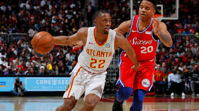 Isaiah Taylor of the Hawks drives against Markelle Fultz of the 76ers at Philips Arena on March 30, 2018. (Photo by Kevin C. Cox/Getty Images)