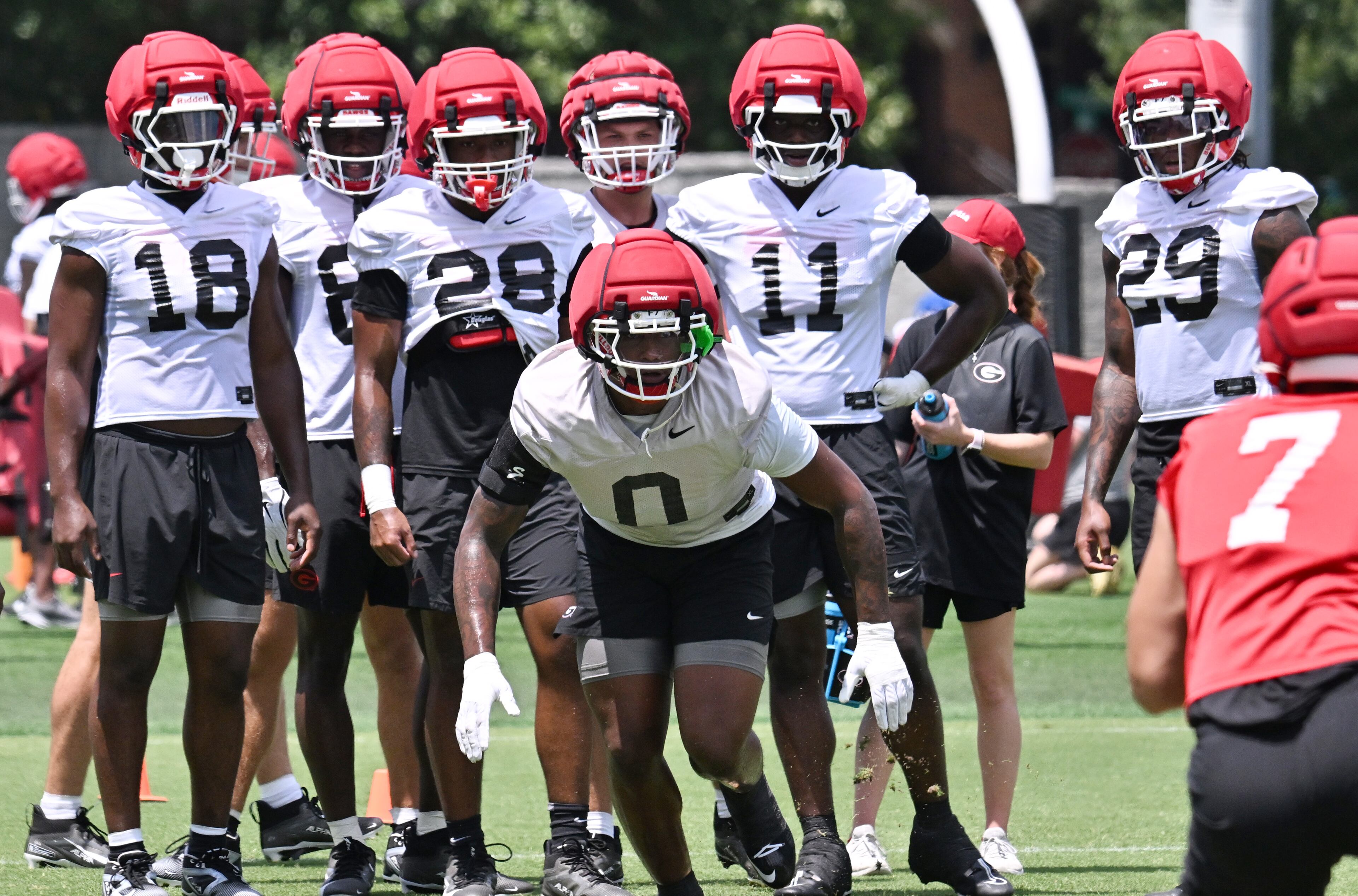 Georgia linebacker Gabe Harris Jr. (0) and other players participate in a football practice at the University of Georgia practice facility, Thursday, July 31, 2025, in Athens. (Hyosub Shin / AJC)