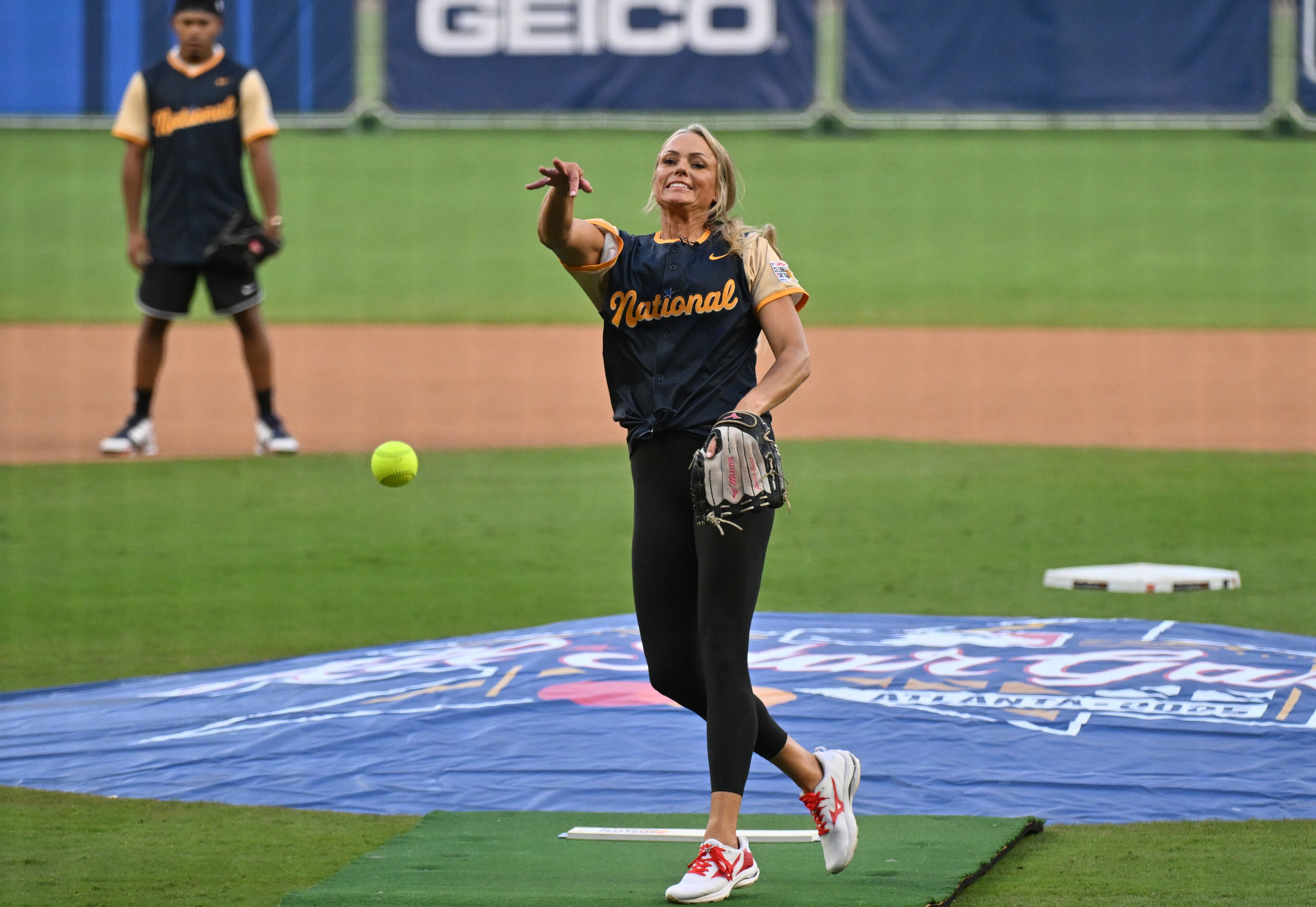 National League’s Jennie Finch, USA Softball Olympian, throws a ball during the MLB All-Star Celebrity Softball Game at Truist Park, Saturday, July 12, 2025, in Atlanta. (Hyosub Shin / AJC)
