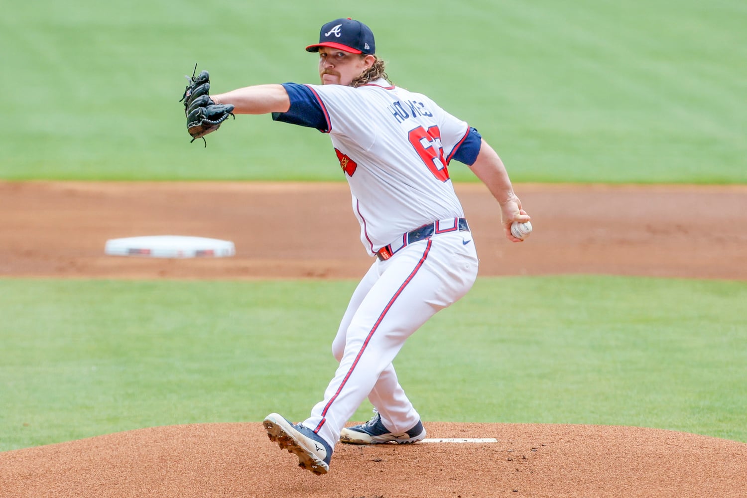 Braves starting pitcher Grant Holmes (66) delivers to a Minnesota Twins batter during the first inning at Truist Park on Sunday, April 20, 2025, in Atlanta. 
(Miguel Martinez/ AJC)