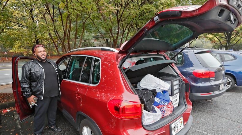 October 16, 2019 - Atlanta - Caleb Hobbs, 29, has many of his possessions organized in his car. He is homeless and has been staying at friends' homes and occasionally out of his car. The closure of nonprofit contractor Living Room has left more than two dozen counties in and around metro Atlanta with no central intake for the $23 million Housing Opportunities for Persons with AIDS program. Bob Andres / robert.andres@ajc.com