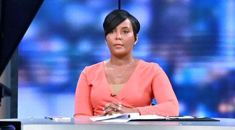 Mayor Keisha Lance Bottoms waits for cue during a town hall meeting to discuss the growing coronavirus pandemic that aired live on WSB-TV Channel 2, CBS46, Georgia Public Broadcasting, 11 Alive, FOX 5 Atlanta and Univision 34 Atlanta at WSB-TV Channel 2 on Thursday night, March 26, 2020.