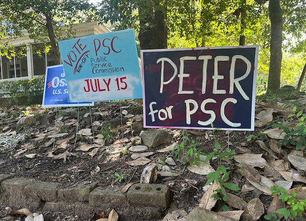 Homemade signs tout the candidacy of Democrat Peter Hubbard for a July 15, 2025, Democratic runoff for Georgia's Public Service Commission on Wednesday, July 9, 2025, in Atlanta. (AP Photo/Kate Brumback)
