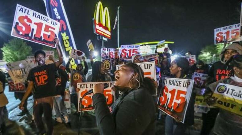Fast food workers in Atlanta want $15 an hour and a union card. John Spink / jspink@ajc.com
