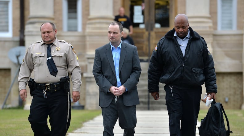 November 26, 2018 Ocilla - Ryan Alexander Duke, charged with the murder of Tara Grinstead, is escorted out after his motion hearings before Chief Judge of the Tifton Circuit Bill Reinhardt at Irwin County Courthouse in Ocilla. HYOSUB SHIN / HSHIN@AJC.COM