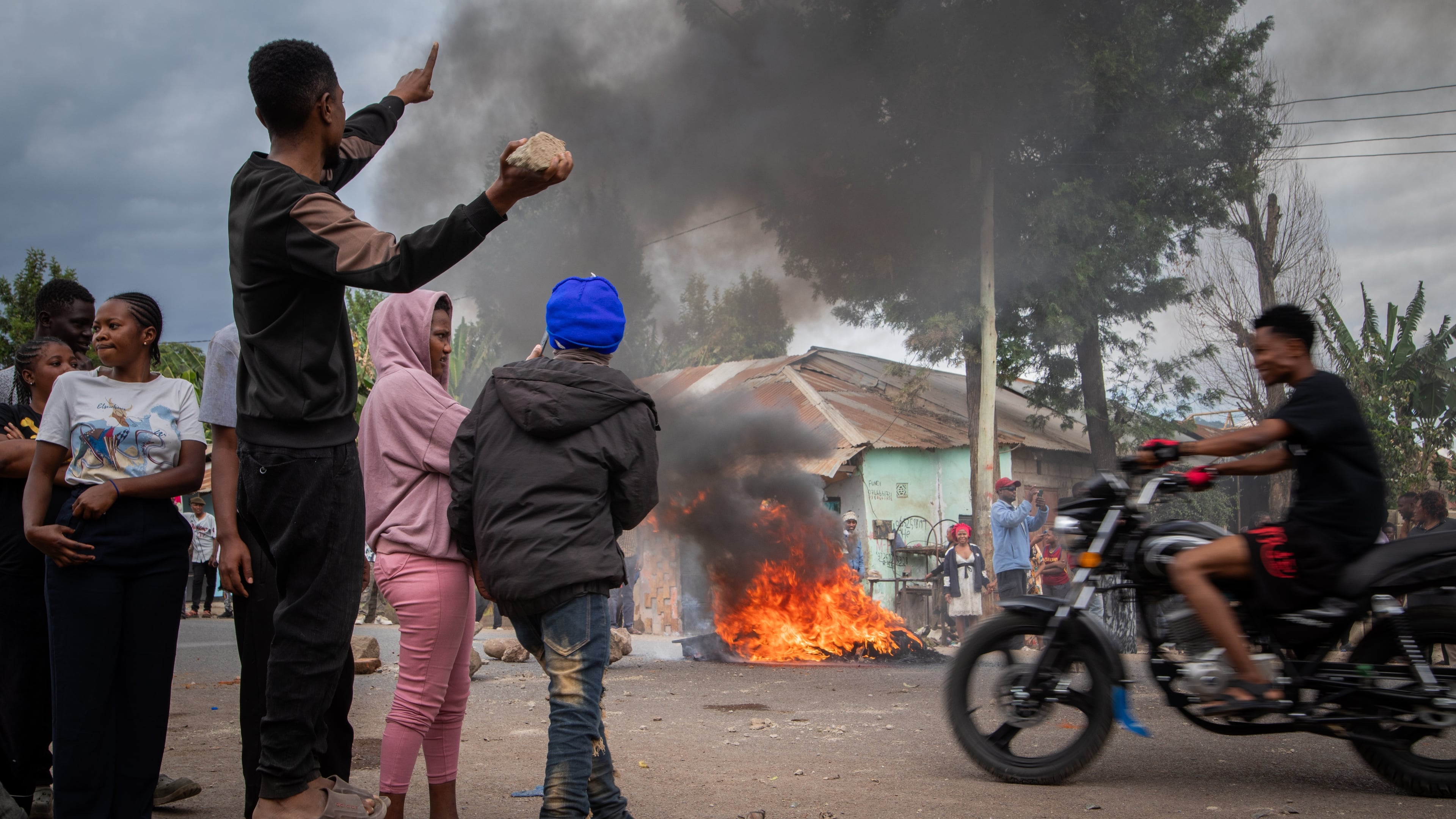 People protest in the streets of Arusha, Tanzania, on election day Wednesday, Oct. 29, 2025. (AP Photo/str)