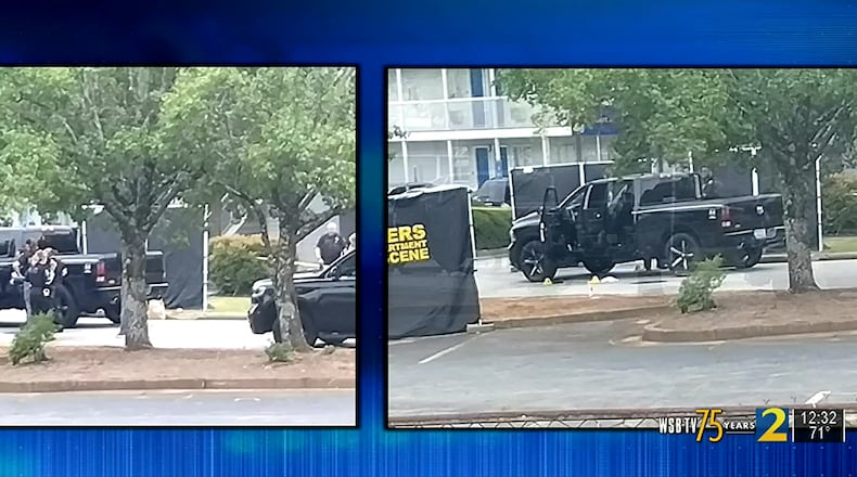 Conyers police found the 33-year-old victim shot to death inside a black pickup truck Sunday morning.