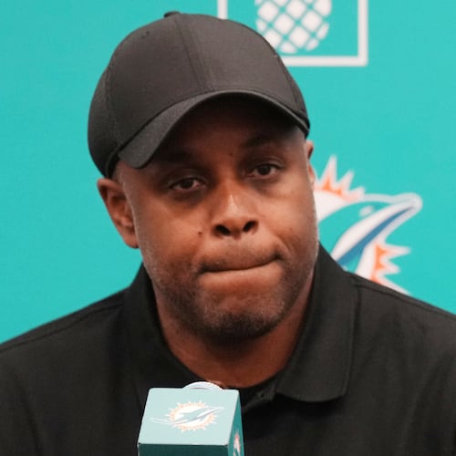 Miami Dolphins general manager Chris Grier listens questions during an NFL football press conference, Friday, April 25, 2025, in Miami Gardens, Fla. (AP Photo/Jim Rassol, File)