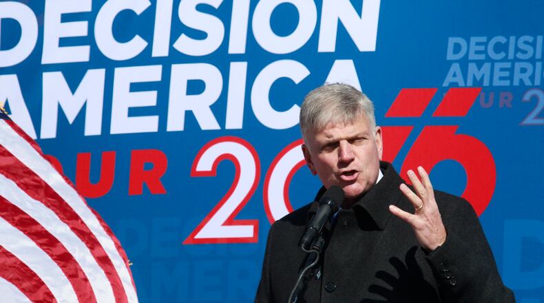 The Rev. Franklin Graham leads a "prayer rally" at Liberty Plaza near the state Capitol on Wednesday, one day after the New Hampshire presidential primaries. Bob Andres, bandres@ajc.com