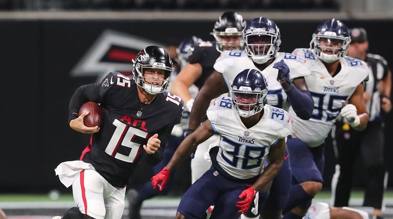081321 Atlanta: Atlanta Falcons quarterback Feleipe Franks breaks loose for a long first down run against the Tennessee Titans during the 4th quarter of a NFL preseason football game on Friday, August 13, 2021, in Atlanta. “Curtis Compton / Curtis.Compton@ajc.com”