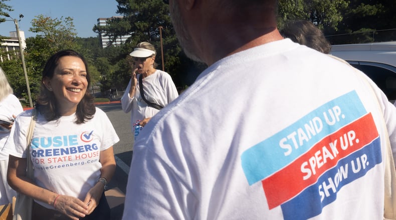 Democrat Susie Greenberg talks with volunteers before they spread out around Sandy Springs neighborhoods to speak with voters on Saturday, Aug. 10, 2024.  (Steve Schaefer / AJC)