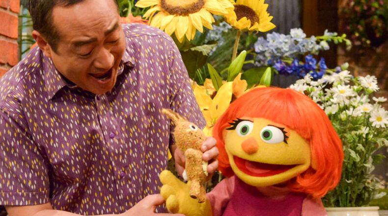 This image released by Sesame Workshop shows Julia, a new autistic muppet character debuting on the 47th Season of "Sesame Street," on April 10, 2017, on both PBS and HBO. (Zach Hyman/Sesame Workshop via AP)