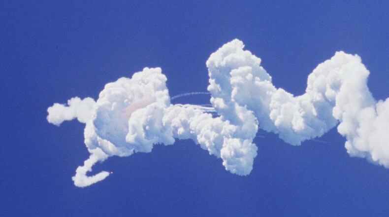 Contrails and puffs of smoke left in the sky from the Space Shuttle Challenger disaster on Jan. 28, 1986. (Red Huber/Orlando Sentinel/TNS)