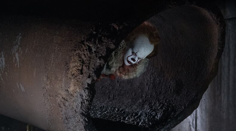 BILL SKARSGÅRD as Pennywise in New Line Cinema's horror thriller "IT," a Warner Bros. Pictures release.