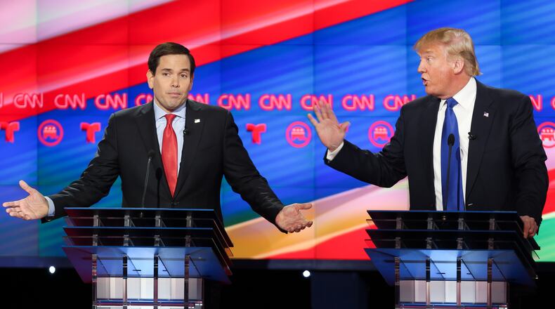 Sen. Marco Rubio and businessman Donald Trump argue at the University of Houston debate. AP/Houston Chronicle, Gary Coronado
