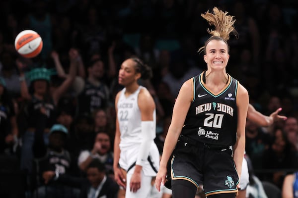 New York Liberty guard Sabrina Ionescu (20) reacts after drawing a foul and scoring during the second half of a WNBA basketball game against the Las Vegas Aces, Saturday, May 17, 2025, in New York. (AP Photo/Heather Khalifa)