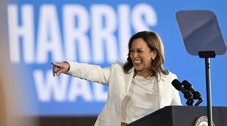 Vice President Kamala Harris greets supporters at a Signature Aviation hangar in Romulus, Mich., on Wednesday.