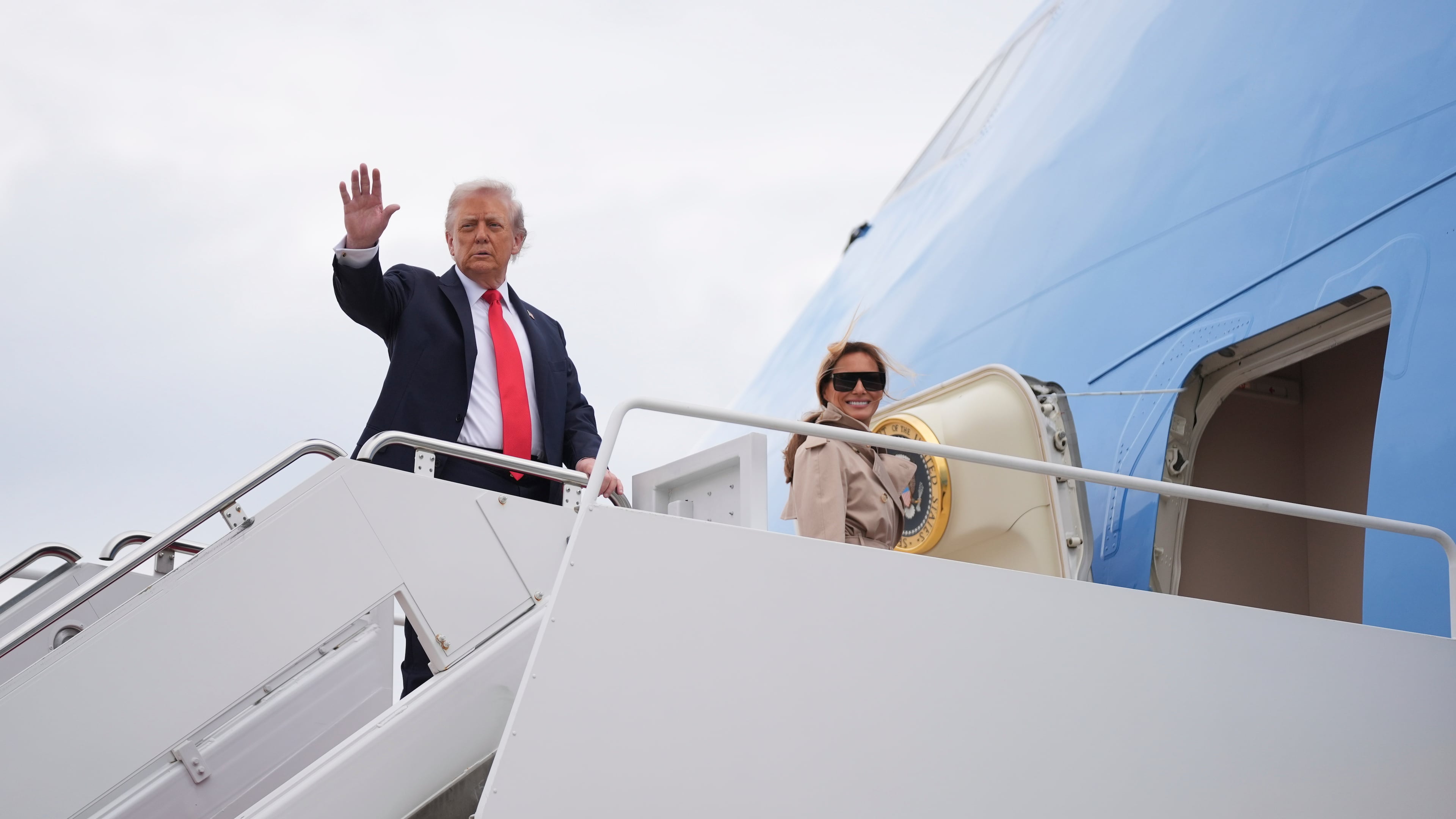 President Donald Trump and first lady Melania Trump board Air Force One, Tuesday, Sept. 16, 2025, in Joint Base Andrews, Md. (AP Photo/Evan Vucci)